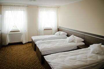 Фото номера Трехместный номер Отель Hotel Podkowa г. Плоцк 4