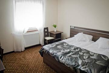 Фото номера Двухместный номер с 2 отдельными кроватями Отель Hotel Podkowa г. Плоцк 5