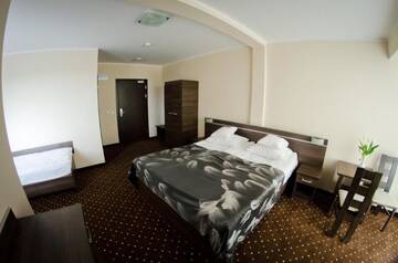 Фото номера Двухместный номер с 2 отдельными кроватями Отель Hotel Podkowa г. Плоцк 6