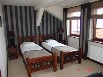 Фото номера Двухместный номер с 2 отдельными кроватями Отель Hotel Tumski г. Плоцк 7