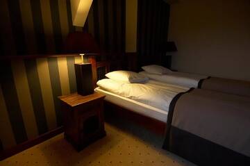 Фото номера Двухместный номер с 2 отдельными кроватями Отель Hotel Tumski г. Плоцк 2